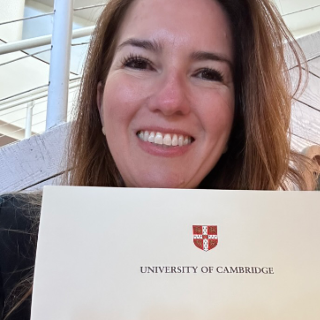 Miranda Braga holding her PCSB certificate