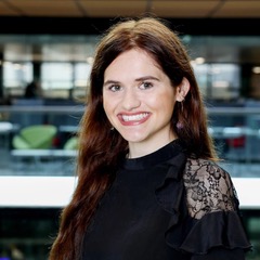 A woman smiling at the camera
