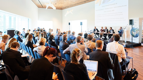 Green Growth Summit VI panel featuring EU policymakers, business leaders and sustainability experts discussing climate action and global green growth.