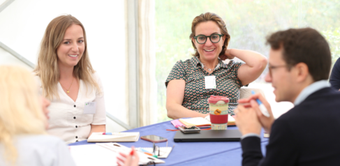 Students working together around a table