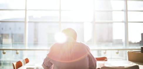 Man reading in office