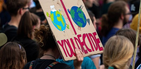 Climate protestors with signs