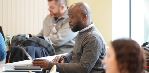 A student looking at his laptop