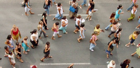 Aerial view of protestors walking down a road