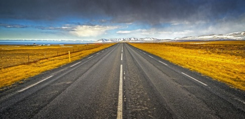 View of road with mountains ahead