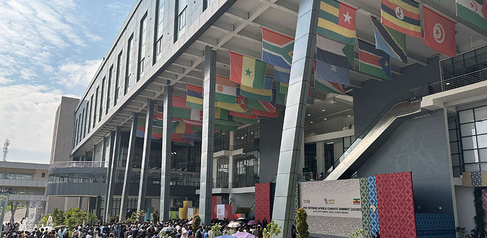 African flags displayed on a building