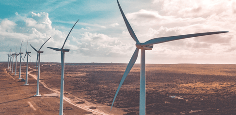 Row of wind turbines in the desert