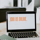 Laptop showing the text "Join us online"