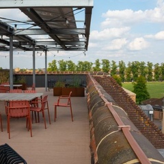 View of the roof of the Entopia Building, with solar panels above and with views towards Parker's Piece