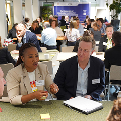 Course delegates in small discussion groups.
