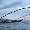 Fishermen on wooden boats. Lake Kivu, Rwanda