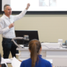 Course Director Theo Hacking presenting in front of students 
