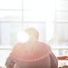 Man reading in office