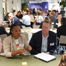 Course delegates in small discussion groups.