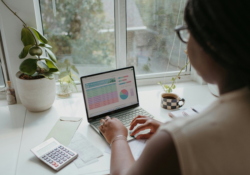 Woman working on finance dashboards