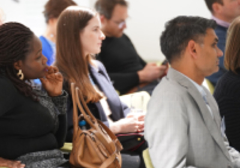 audience listening at CISL event