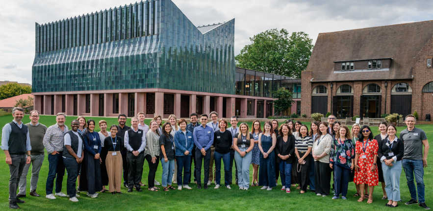A group of students stood in a group outside Homerton College dining hall