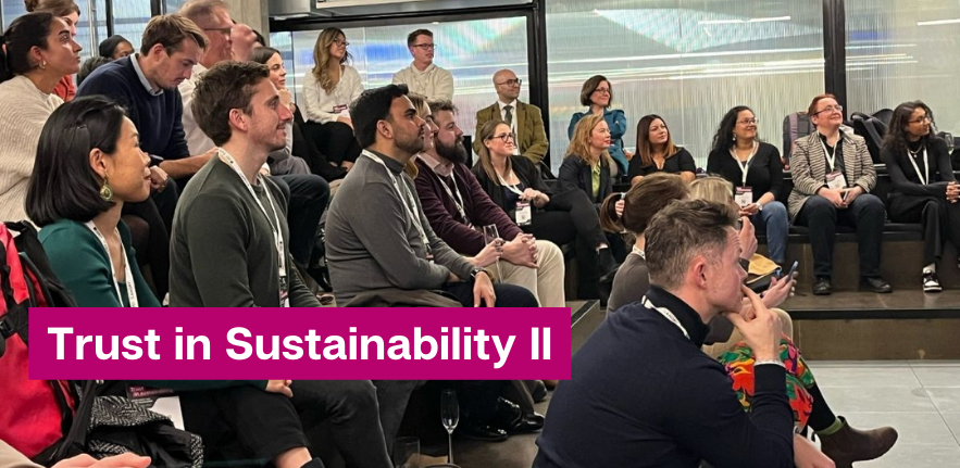 Trust in Sustainability 2023/2024 Cohort The participants of the first cohort of CISL's and BSI's trust in sustainability accelerator are sitting in an event room, all concentrating and smiling at an unseen presenter, as they enjoy a day in London of learning and practising their pitches.